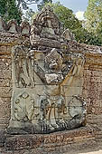 Preah Khan temple - gigantic sandstone garuda on the fourth enclosurewall (east entrance), 